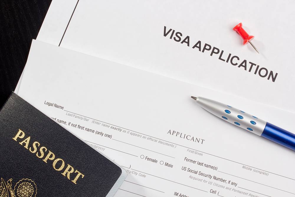 Image of a Visa Application form, featuring 411 Immigration Law and highlighting Critical Steps in the Investor Visa Application, ensuring it aligns with the page's context.
