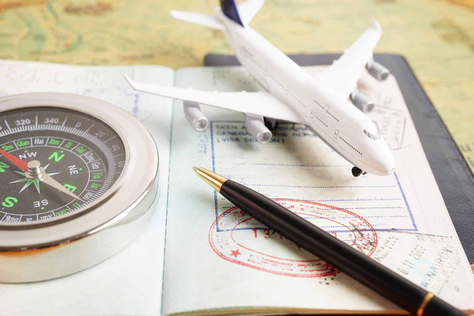 Passport symbolizing international travel, featuring 411 Immigration Law and highlighting 'How the Diversity Visa Lottery Works' to explain the visa application process.