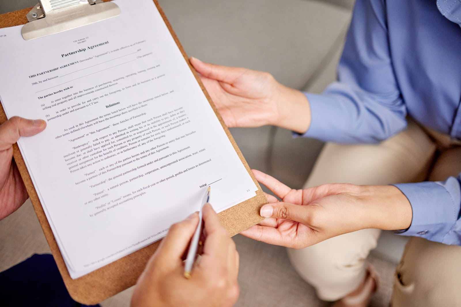 Image of an application form being filled out, symbolizing the start of the process. Text overlay features '411 Immigration Law' and 'Initial Application Submission,' emphasizing expert assistance with beginning immigration applications.